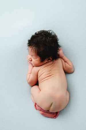 Newborn photography in studio of family and children based in Colorado including baby details