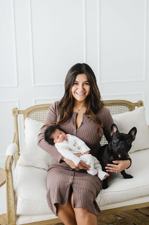 Newborn photography in studio of family and children based in Colorado including baby details and pets from home