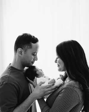 Newborn photography in studio of family and children based in Colorado. studio photo of parents with newborn baby