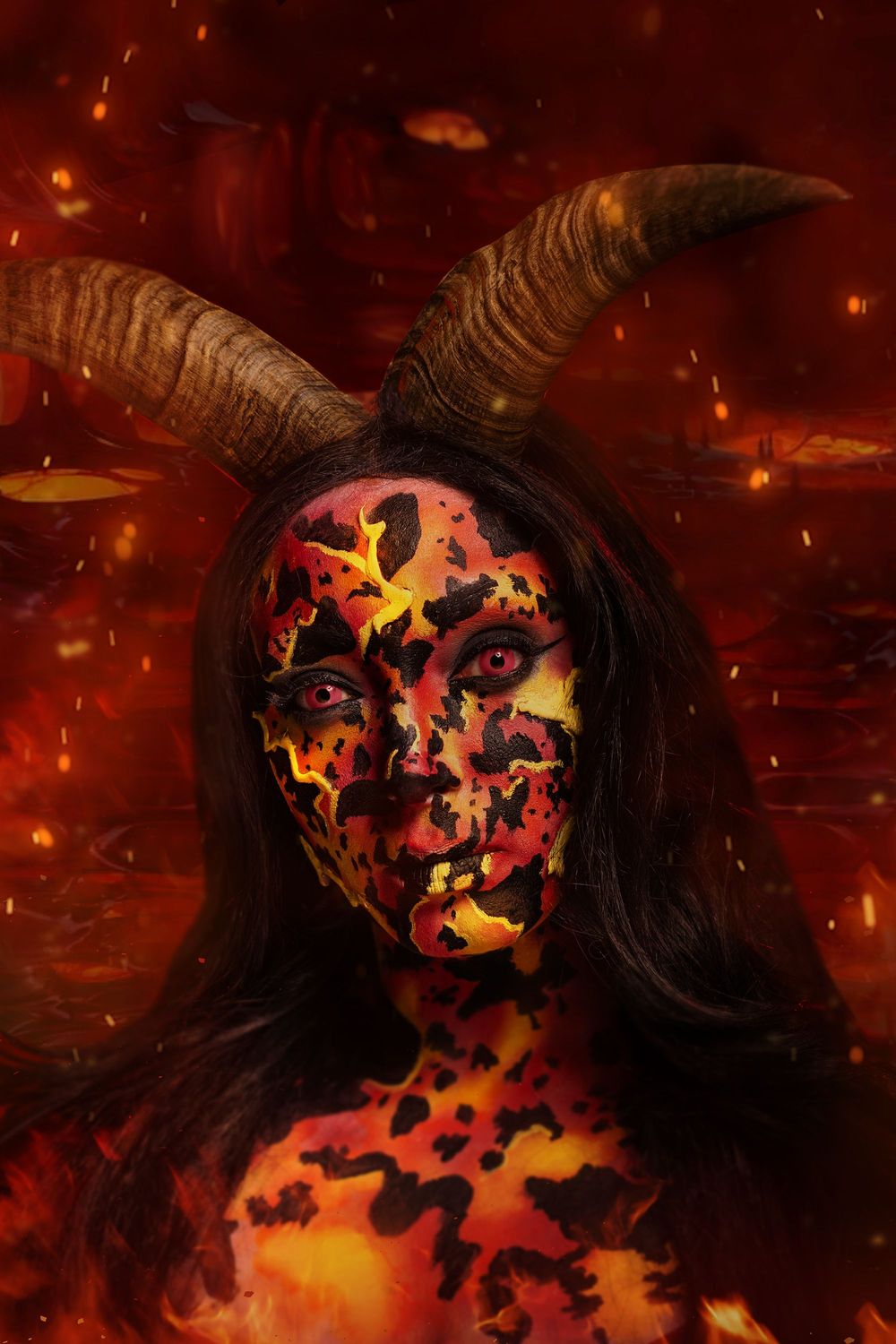 Fiery special effects makeup with molten lava illusion body paint and dramatic character design.