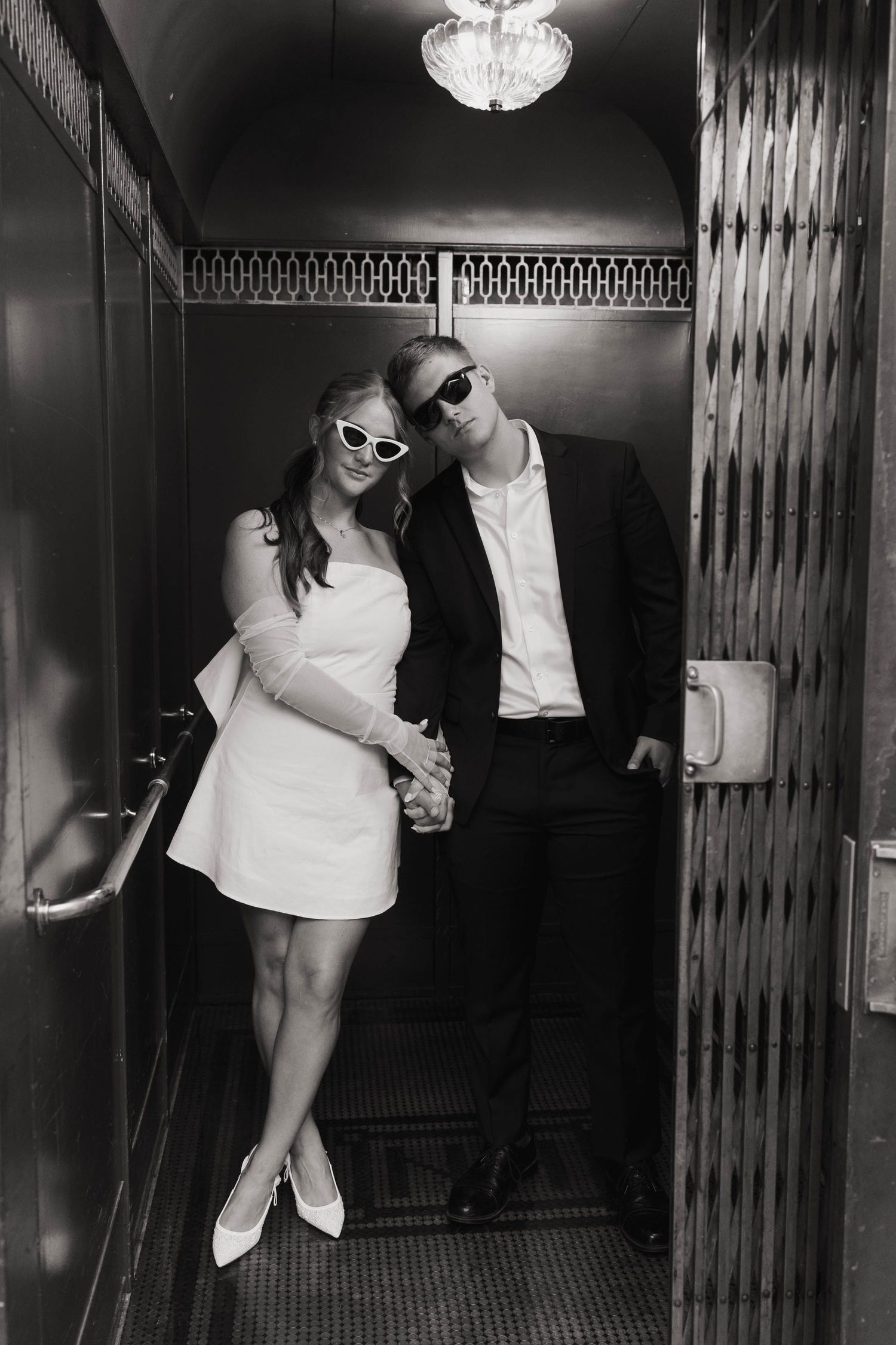 Nazareth Hall Elevator dreamy engagement photoshoot at Nazareth Hall in Grand rapids Ohio captured by photographer Autumn Case wit
