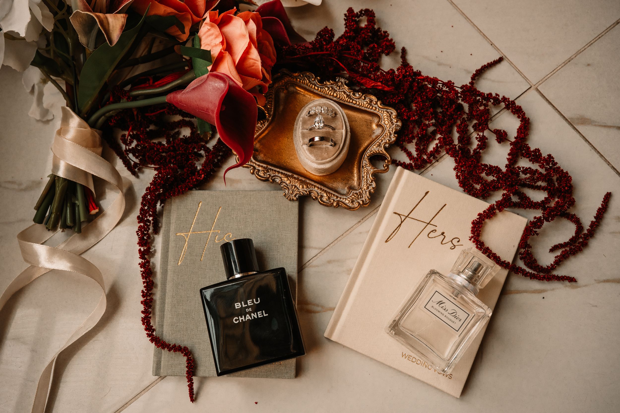 DFW wedding photography flat lay featuring dark and moody red florals and gold timeless elements by Jaime Layne Photography in Fort Worth