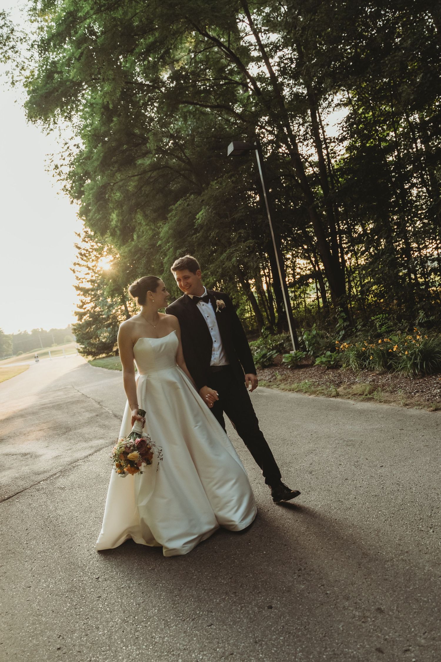 bride and groom at sunset