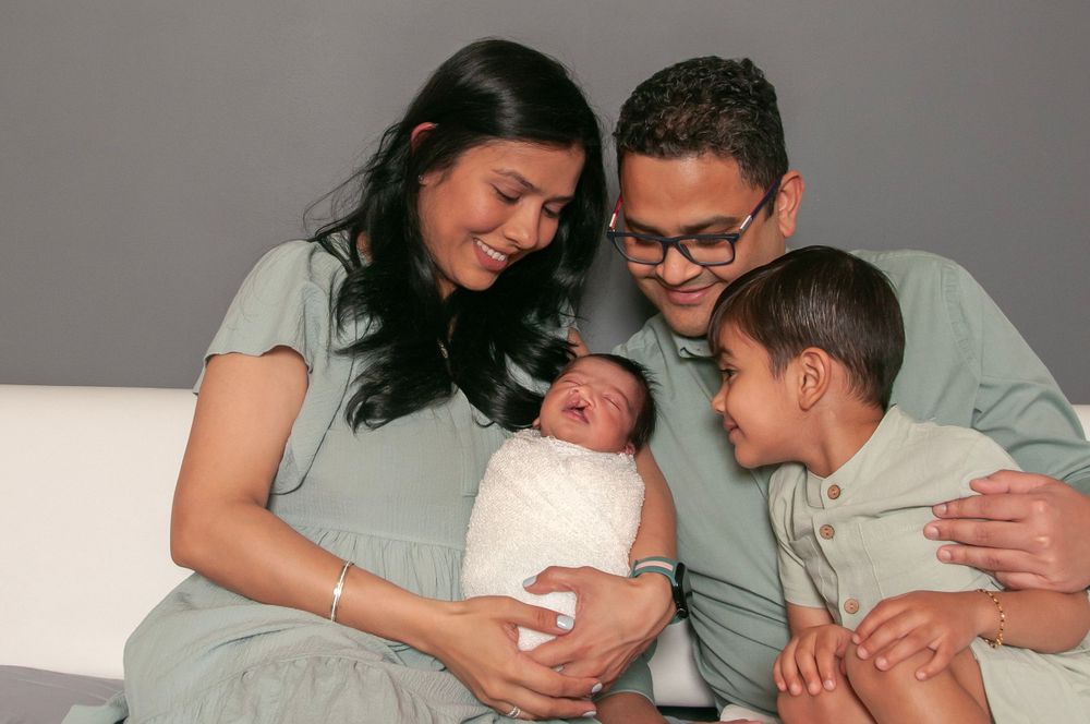 family photo with newborn baby boy in home session