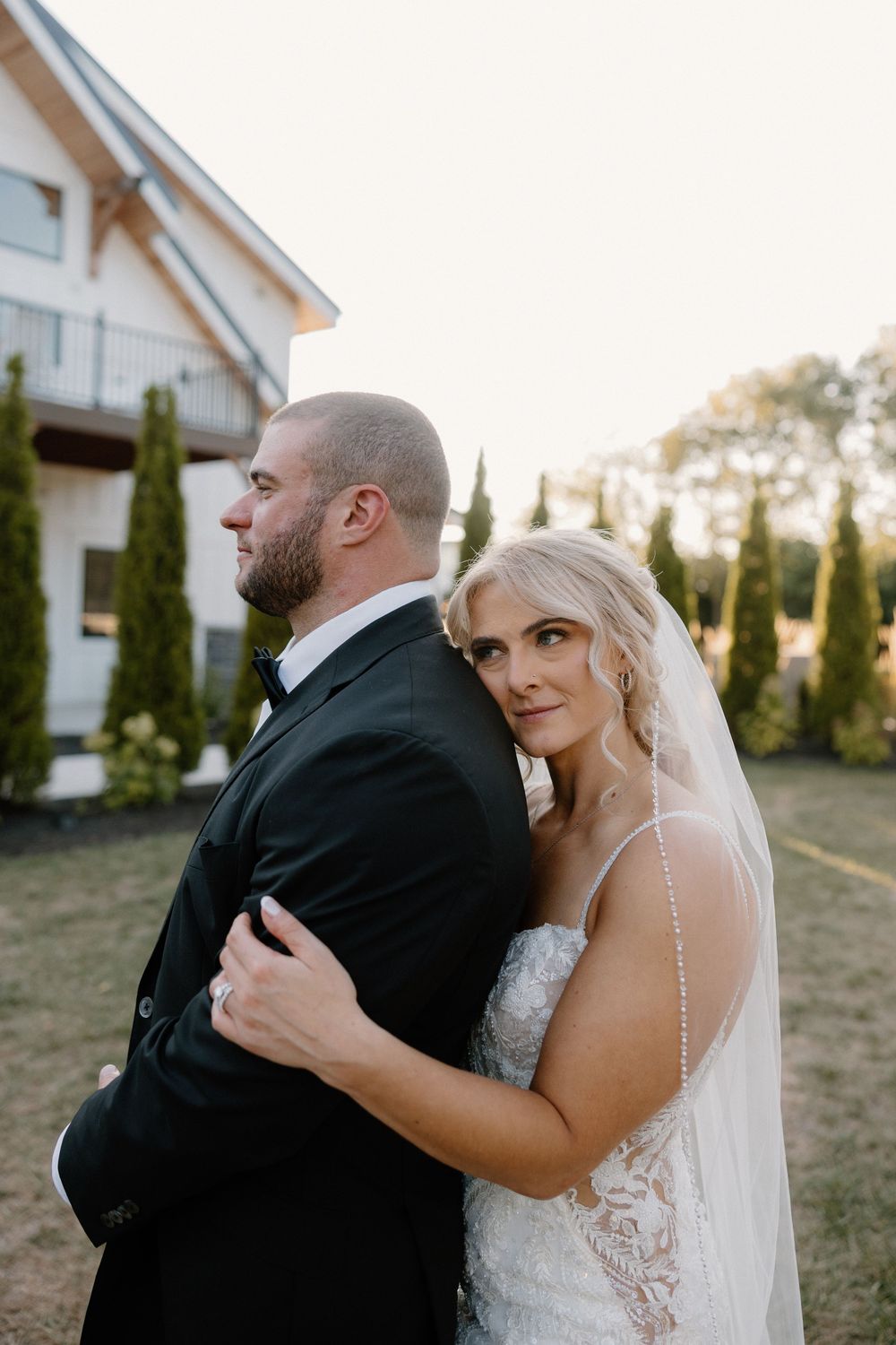 Romantic outdoor wedding photography sequence showing tender moments between newlyweds against a backdrop of cypress trees.