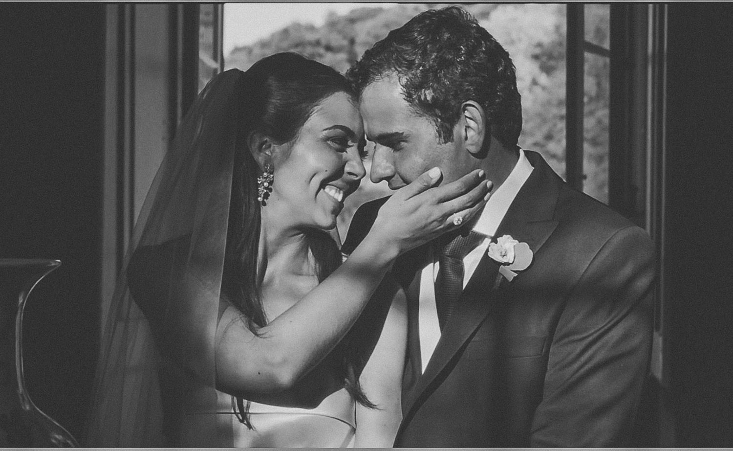 Wedding photo shoot in rustic outdoor setting with natural lighting and greenery.