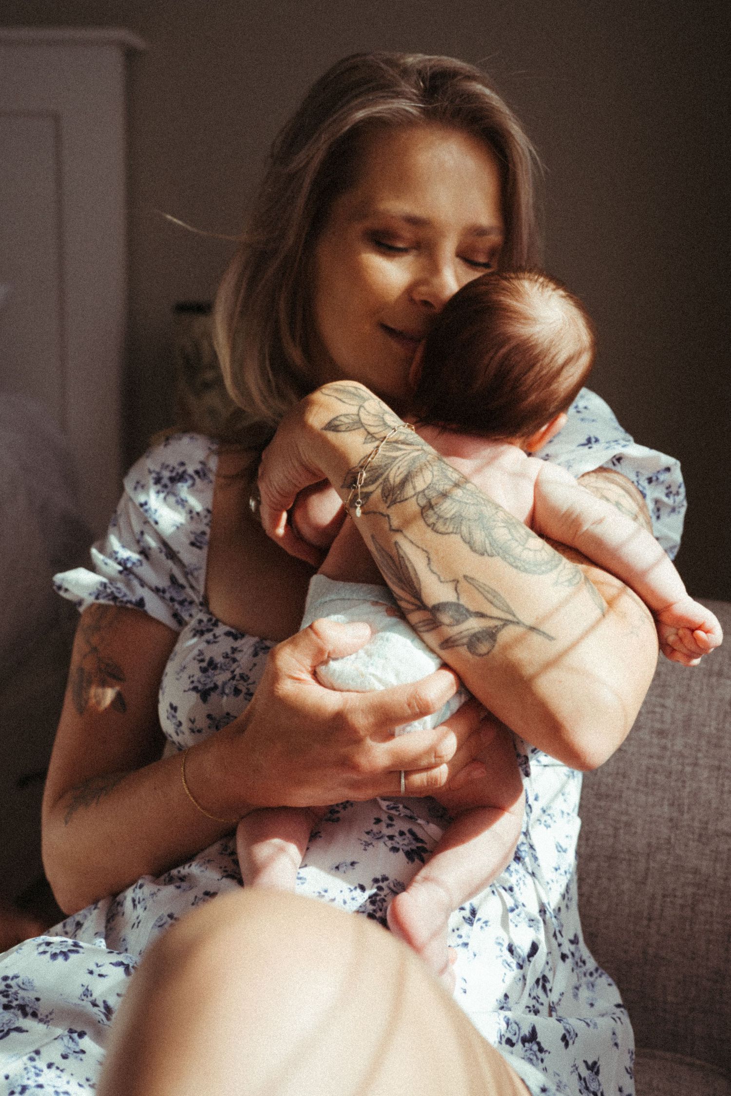 Series of gentle photographs showing loving interaction in warm indoor lighting.