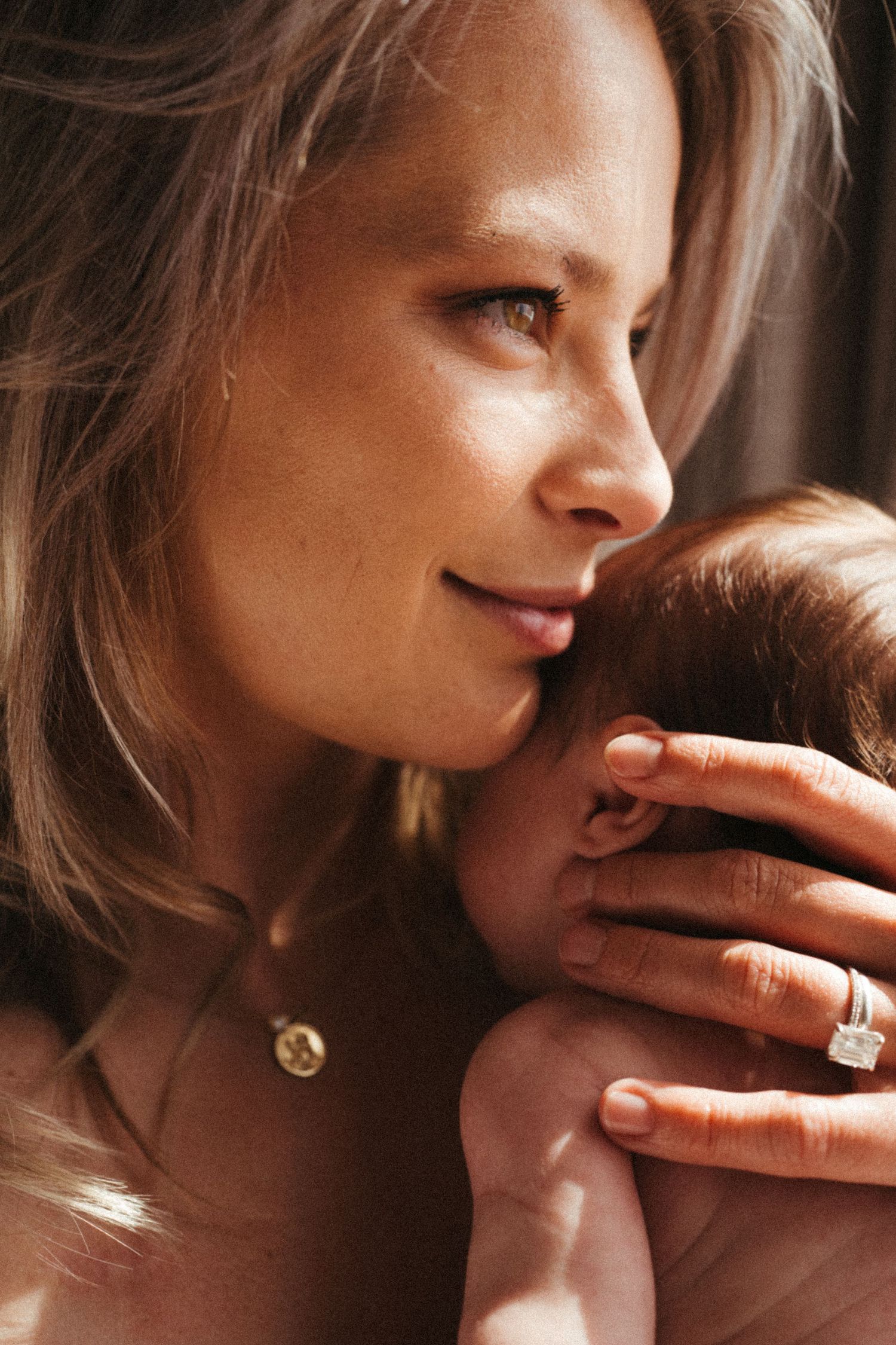 Close-up series capturing intimate moments with soft natural window lighting.