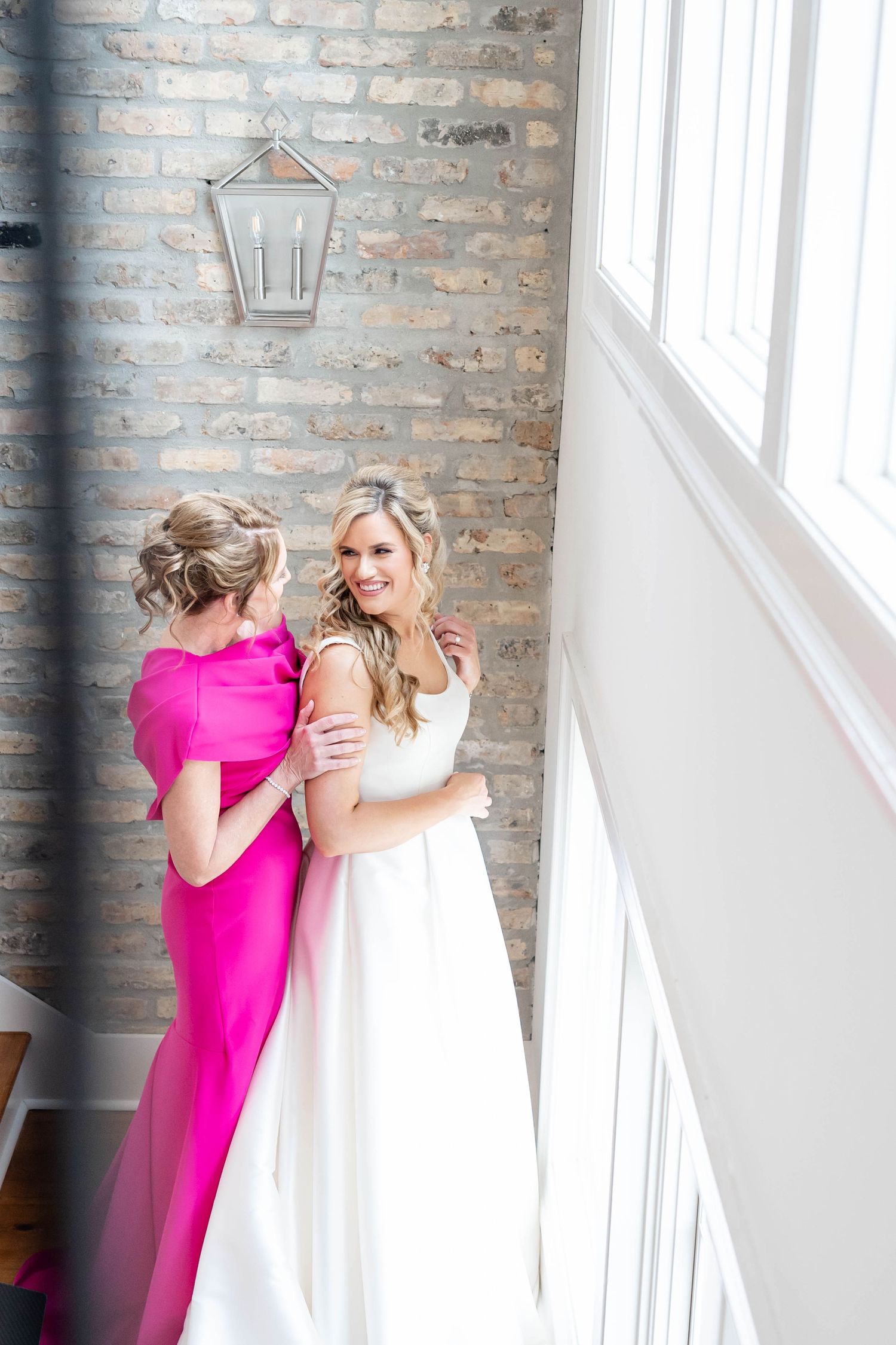 bride with mom with pink dress