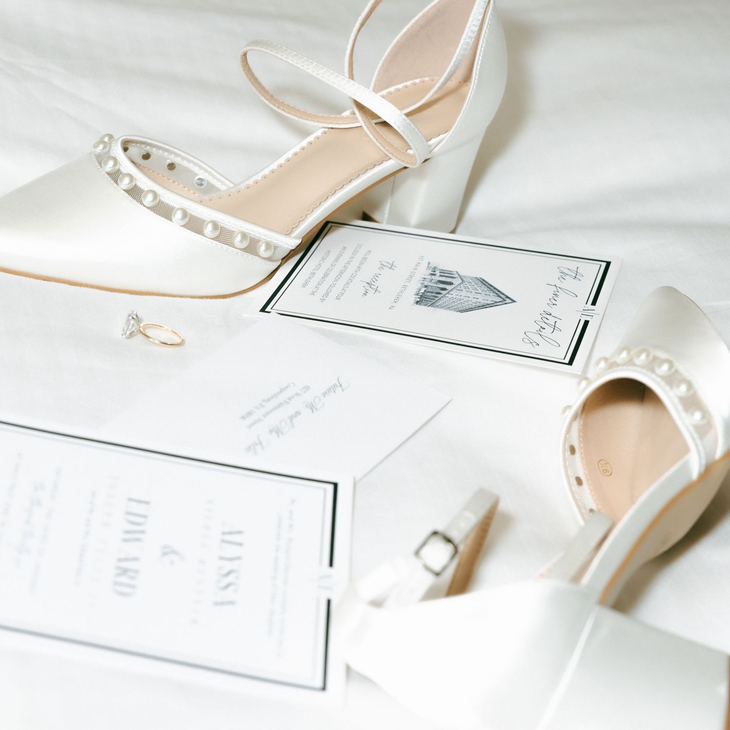Sunlight streams through a white curtained window creating a soft, dreamy atmosphere in a bright interior.