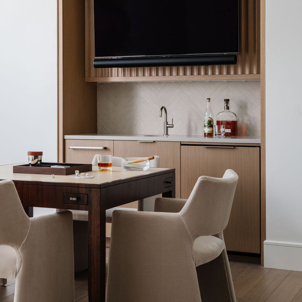Home entertainment room with game table and TV