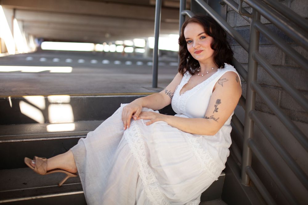 Girl dressed up portrait photo shoot in parking garage