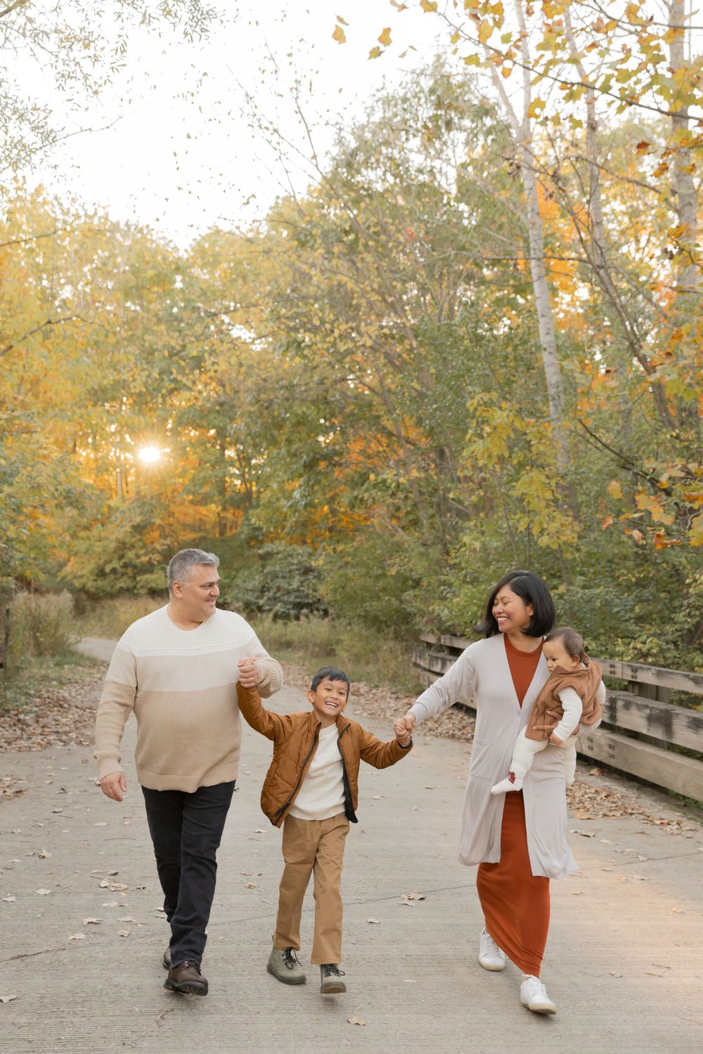 family wearing fall weather tone clothes in october
