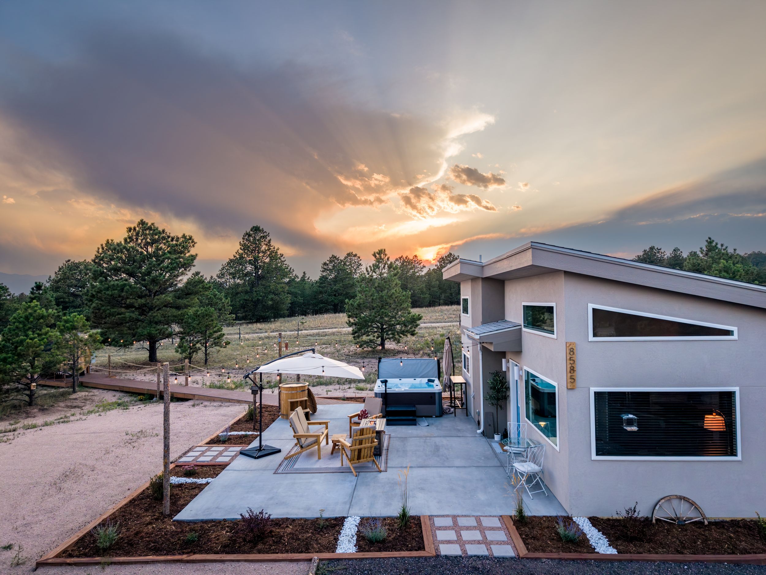 Aerial/drone shot of a luxury vacation rental at sunset in Colorado Springs, CO.