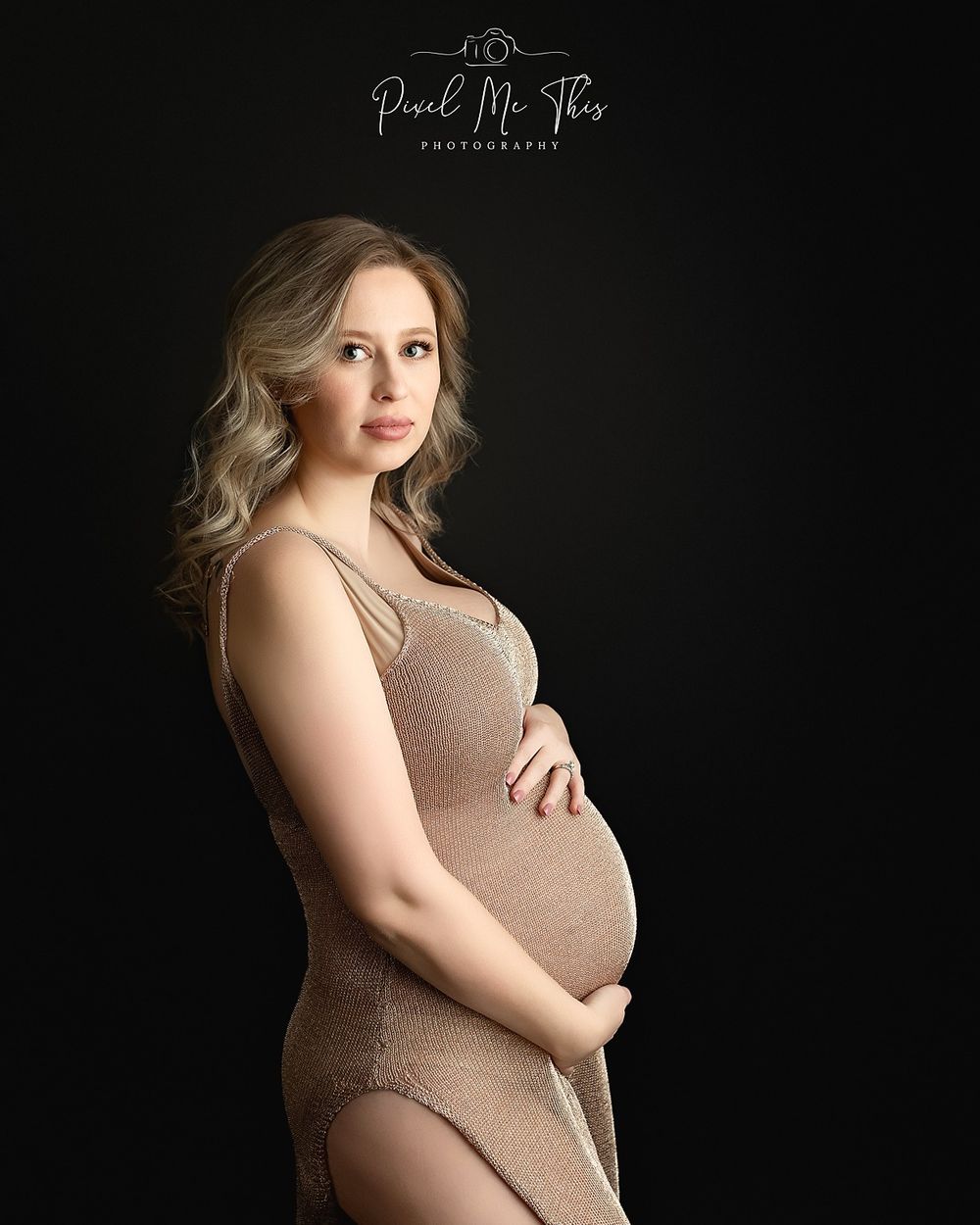 A beautiful blonde maternity client holding her belly. Greenville SC newborn photographer. - Easley Sc newborn photographer. Greenville SC p