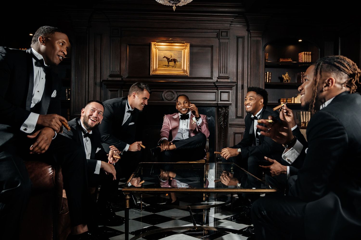 Classic groom’s party gathering in a stylish, vintage-inspired lounge, enjoying a celebratory toast before the ceremony.