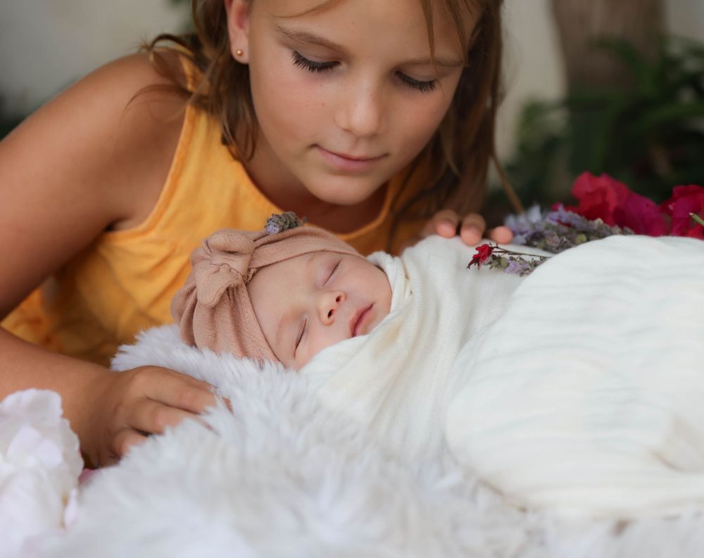Sister & baby newborn photography, newborn photography.  Family photographs.  Baby photographs, Dorset family photography