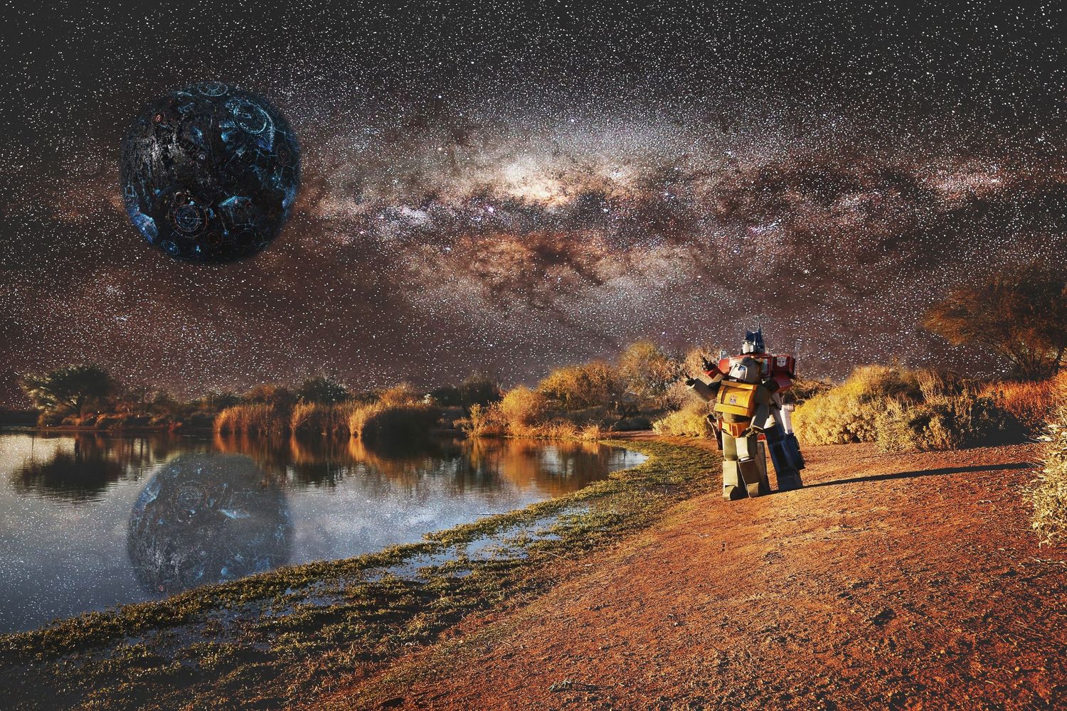 A motorcyclist rides a red dirt road beside a lake under the Milky Way with a large dark planet in the sky.
