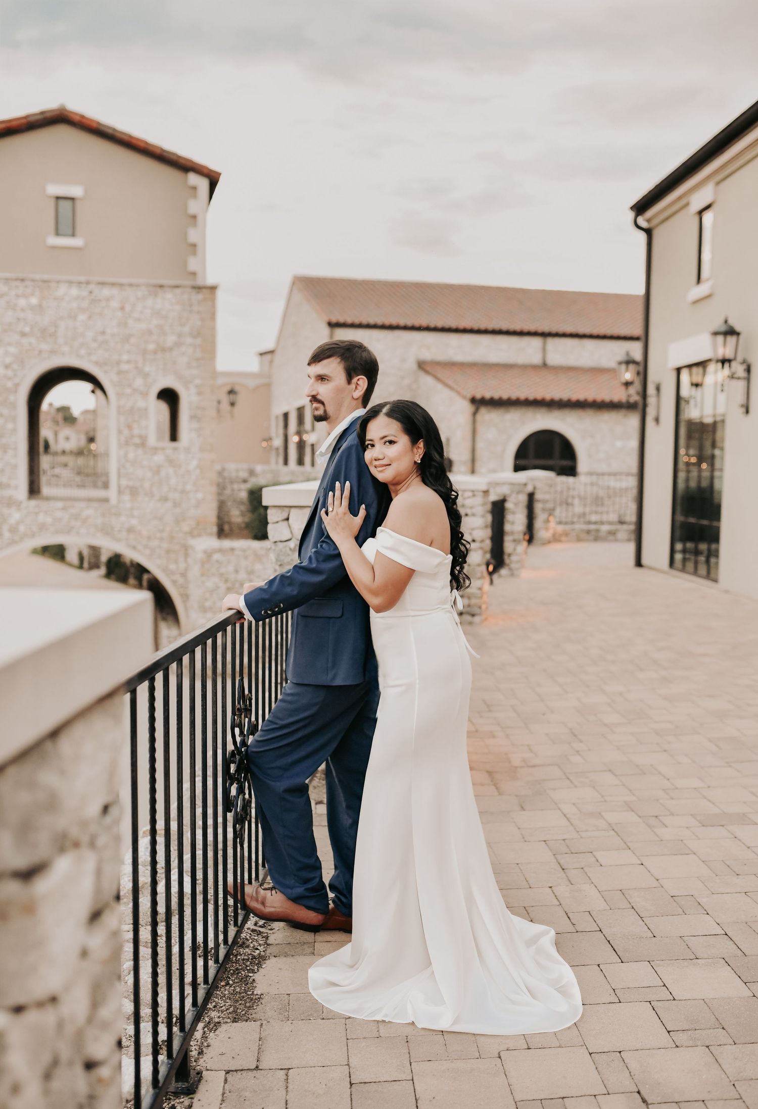 Romantic candid moment between an engaged couple during their North Texas sunset session