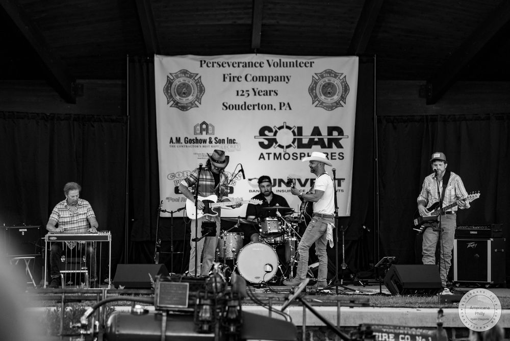 Solar Atmospheres band performing on stage at Perseverance Volunteer Fire Company 125th anniversary event.