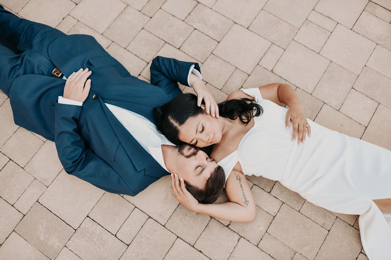 Editorial engagement photography with a couple surrounded by Chapel at Palacios stone architecture