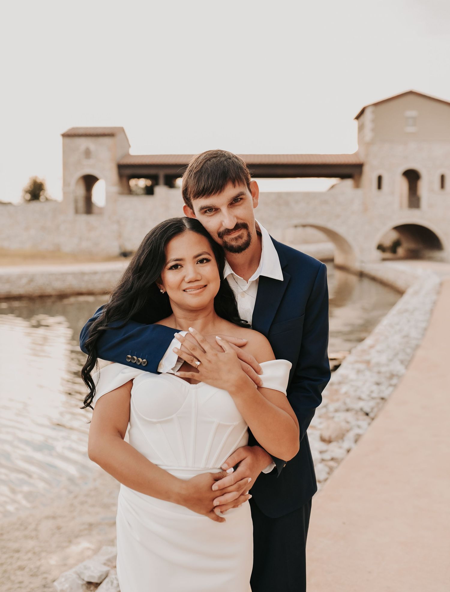 Couple dressed in white and navy for an elevated North Texas engagement photography session
