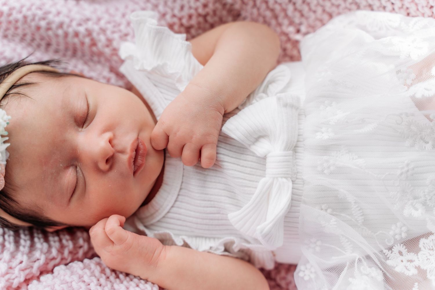 sleeping newborn baby girl photographed during a newborn photography session in west Tennessee, Humboldt, TN