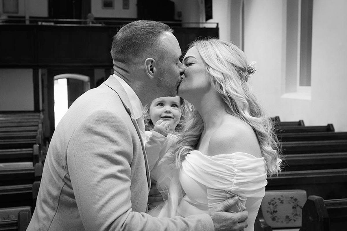 First kiss at Jamie & Anna's Lake District elopement wedding