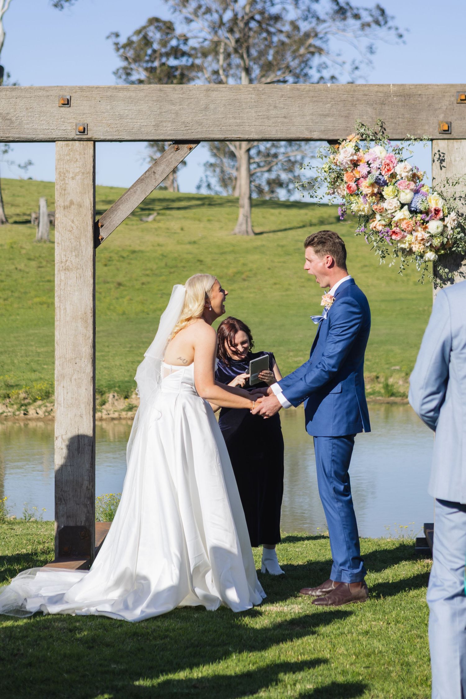 Jess and Lachie’s wedding ceremony overlooking the dam at Dungog Weddings
