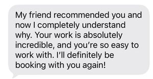 A five-star client review text message recommending a photographer based on a friend's referral praising incredible work and ease.