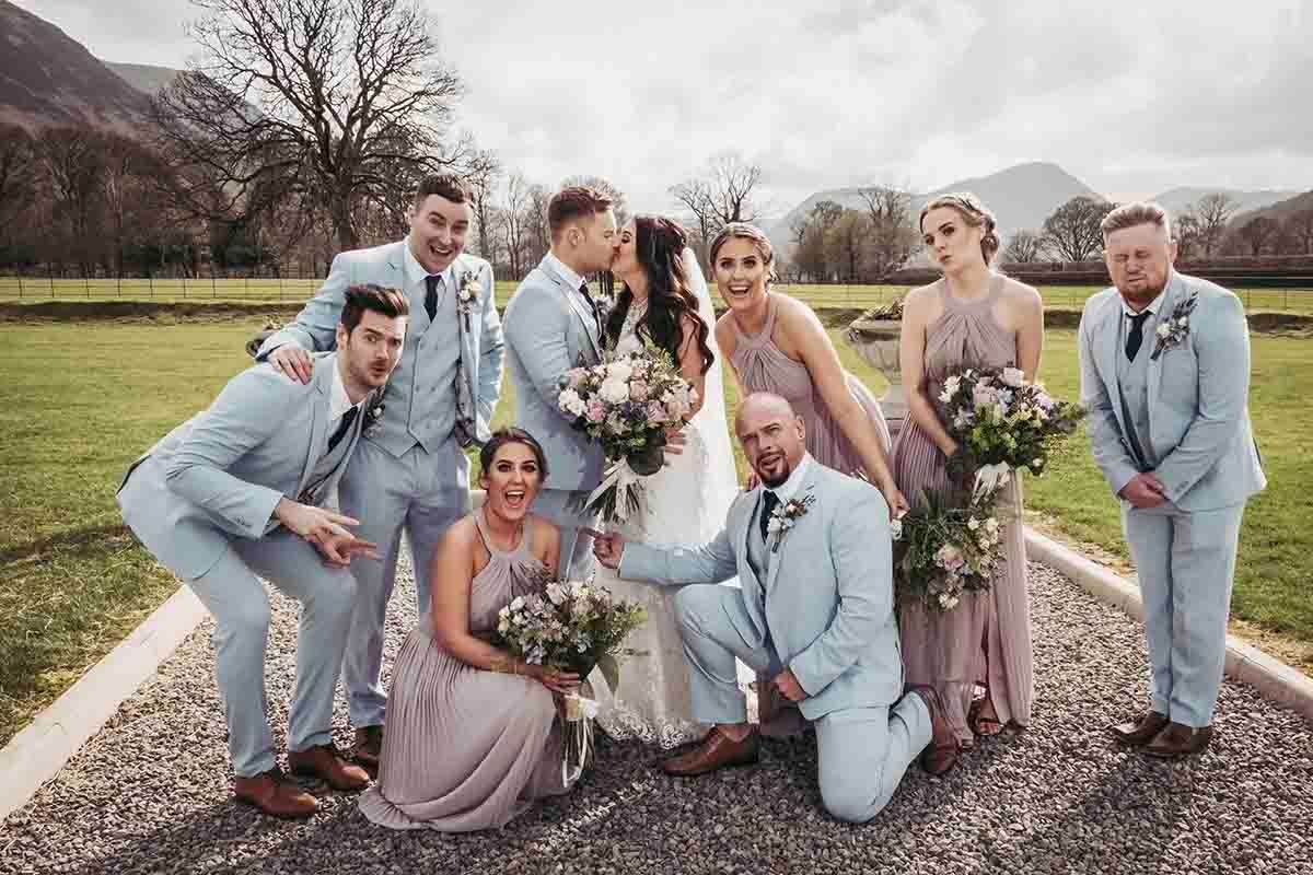 Wedding party messing about at New House Farm near Cockermouth