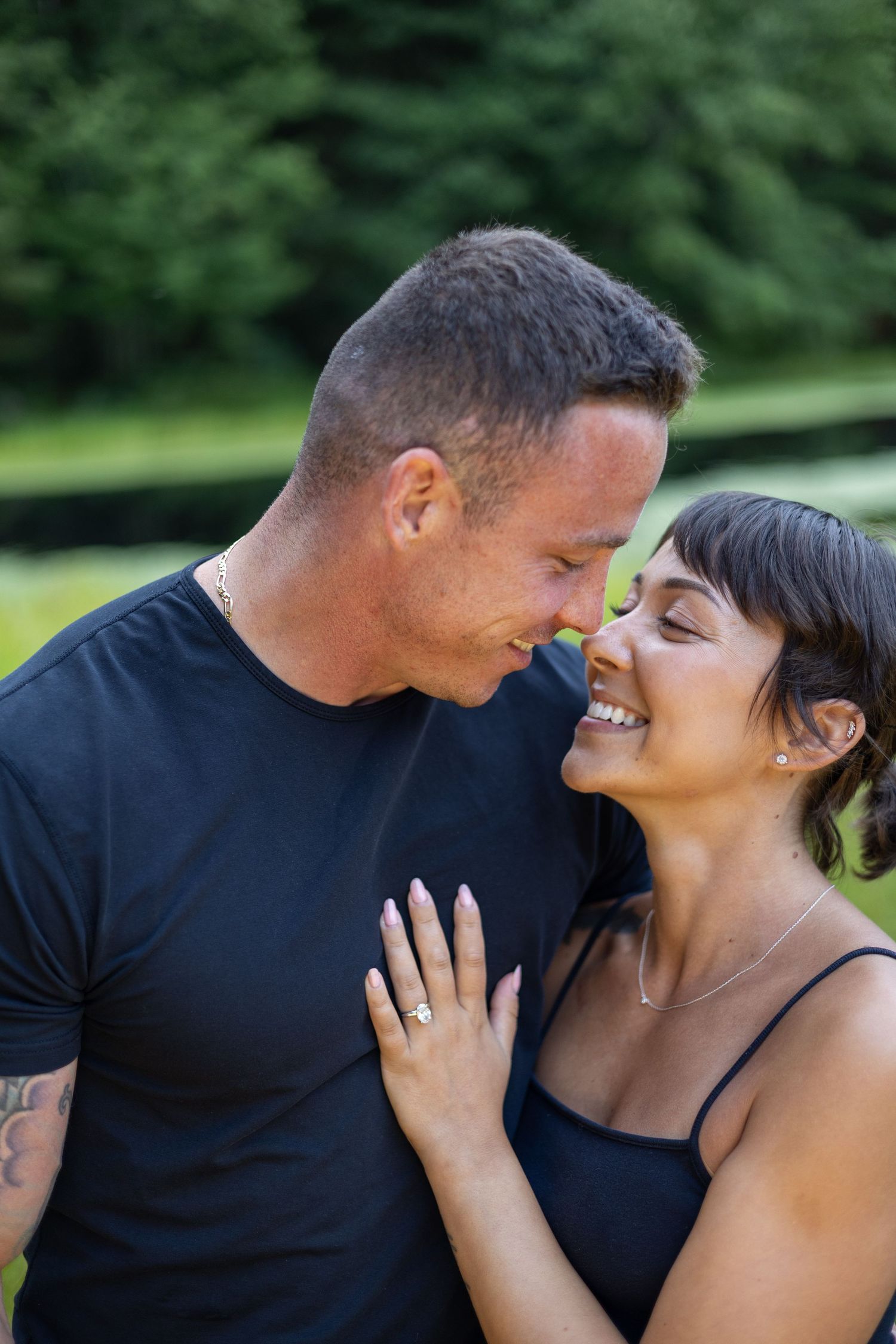 Engaged couple embracing during a golden hour session