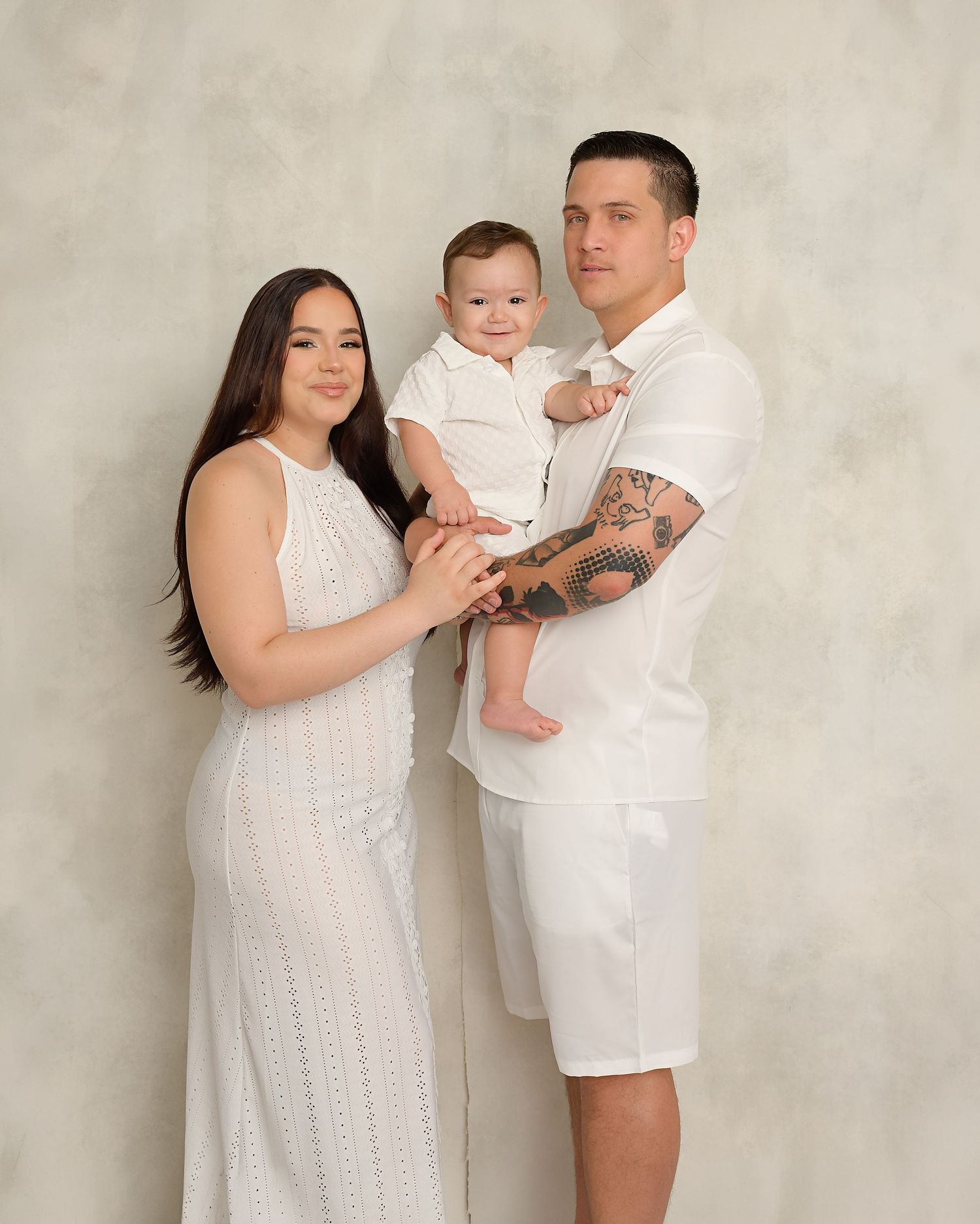 Family portrait with parents and children during a newborn photography session in Zephyrhills, FL