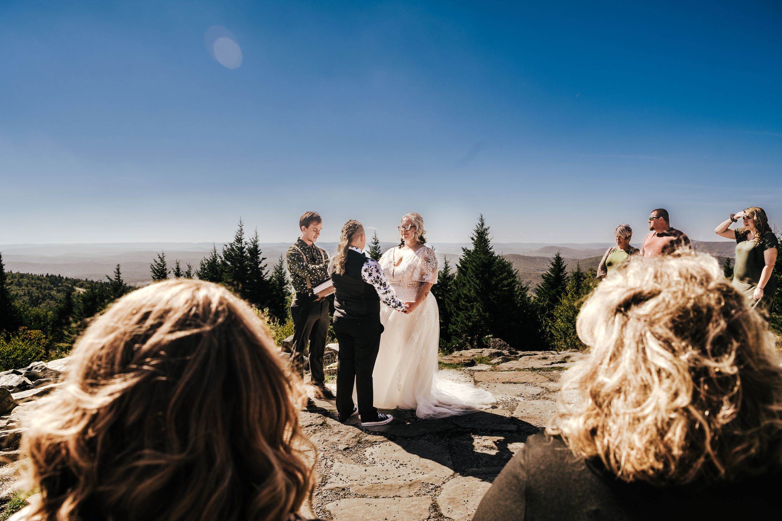 two brides exchange vows on top of Spruce Knob surrounded by their closest family and friends for their west virginia elopement.