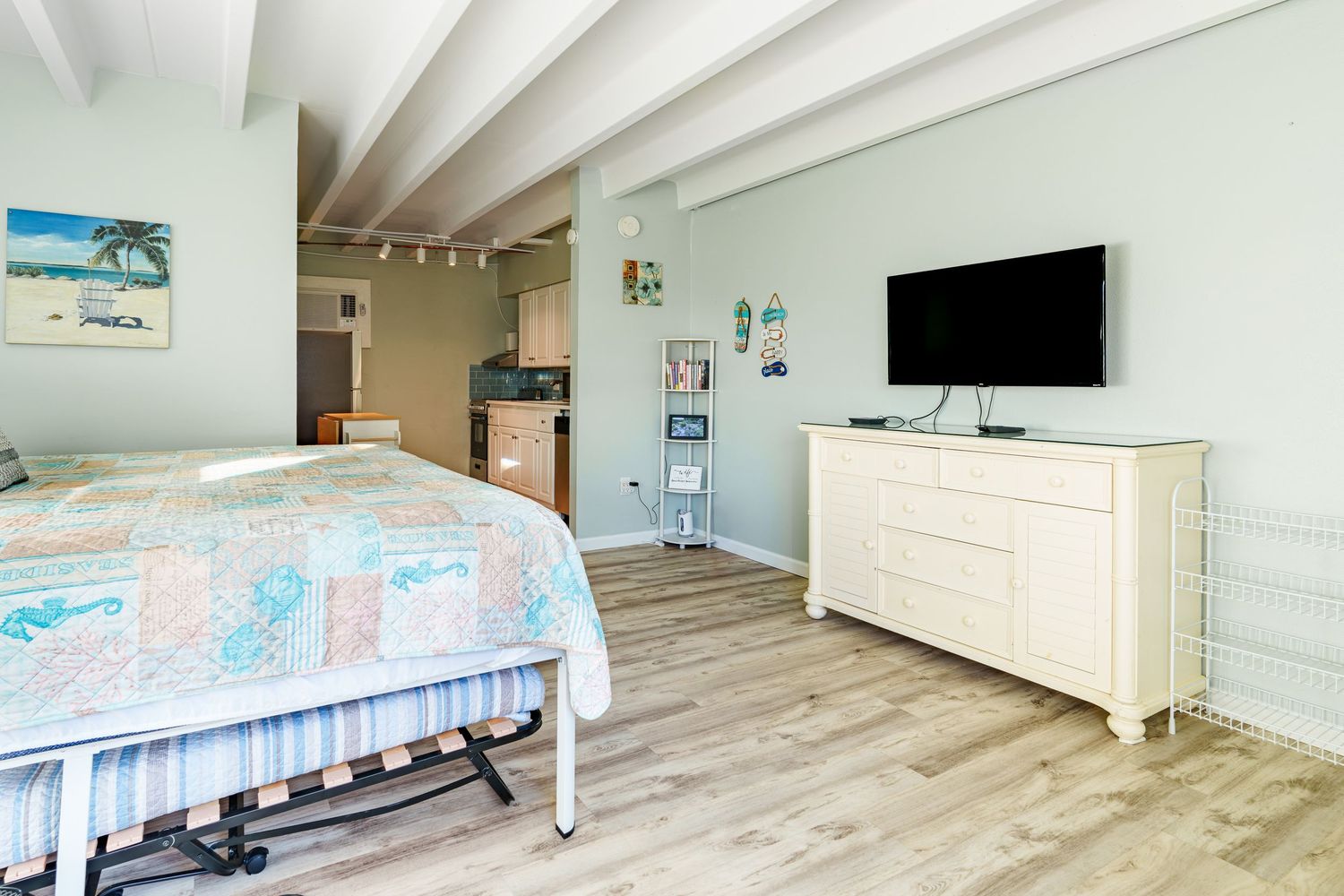 Open bedroom and living space inside a Panama City Beach beachfront condo