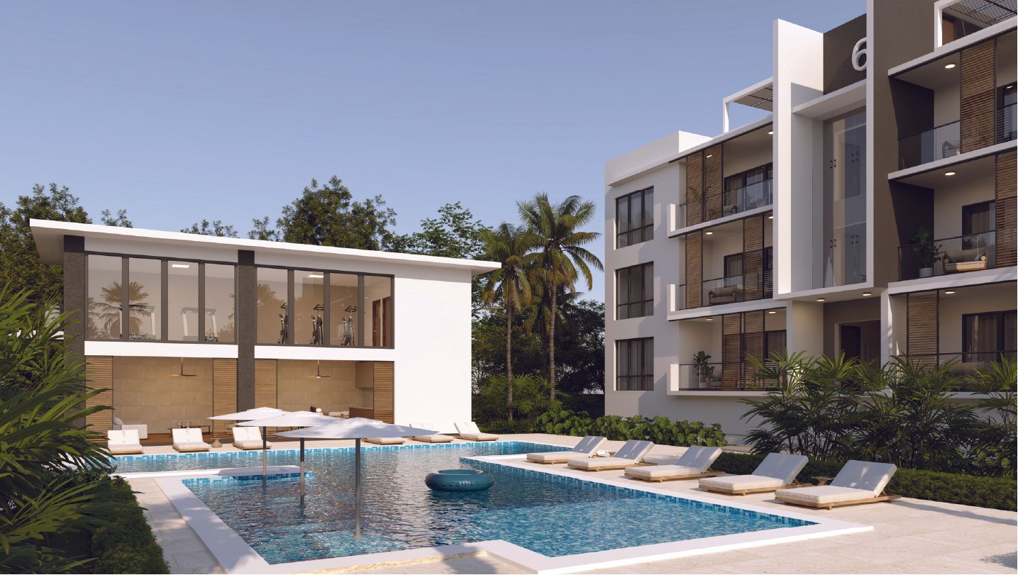 Luxury residential complex featuring sparkling outdoor pool with sun loungers and modern apartment building.