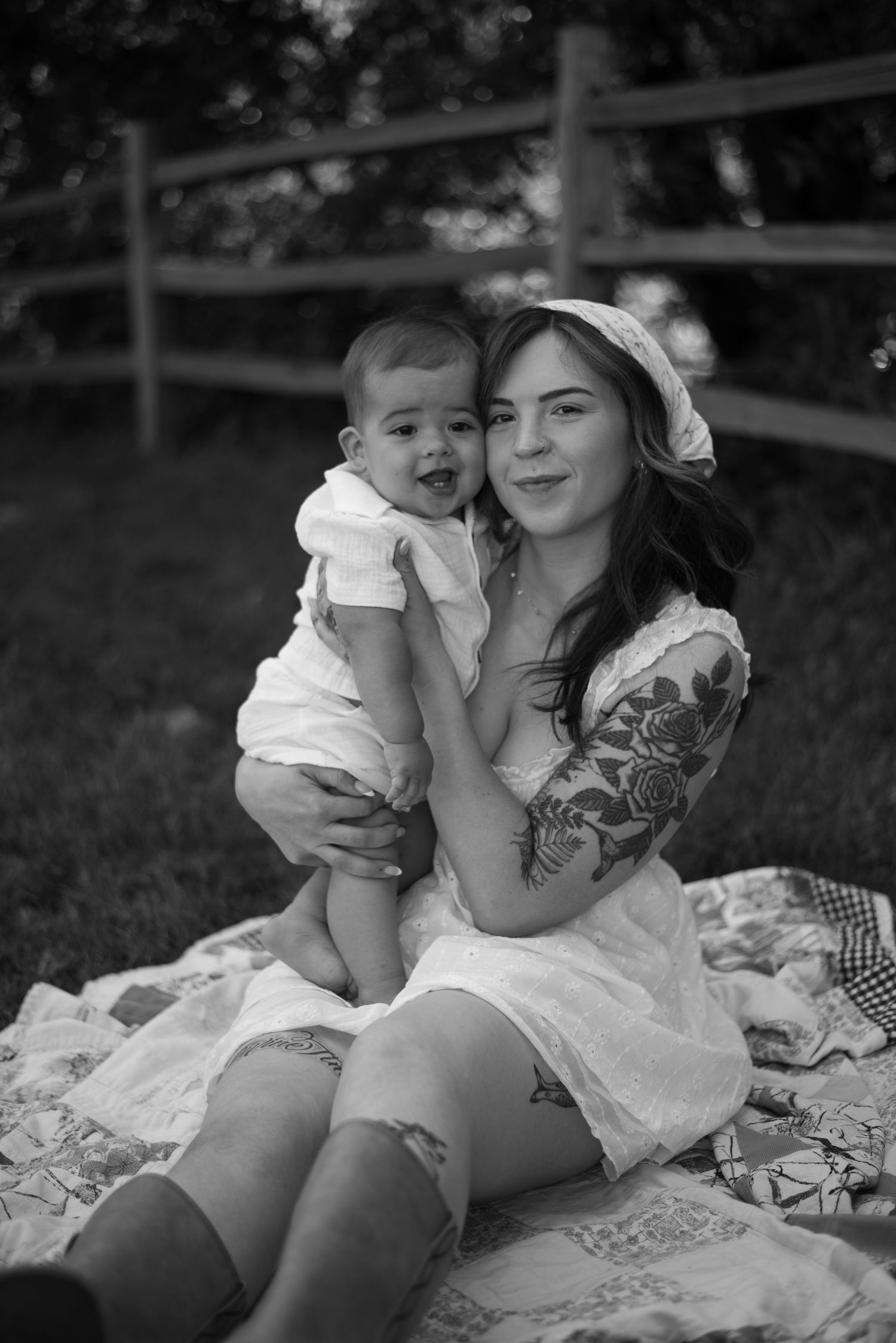A mother and child wrapped up in each other, capturing the tenderness, laughter, and little moments that make motherhood so fleeting.