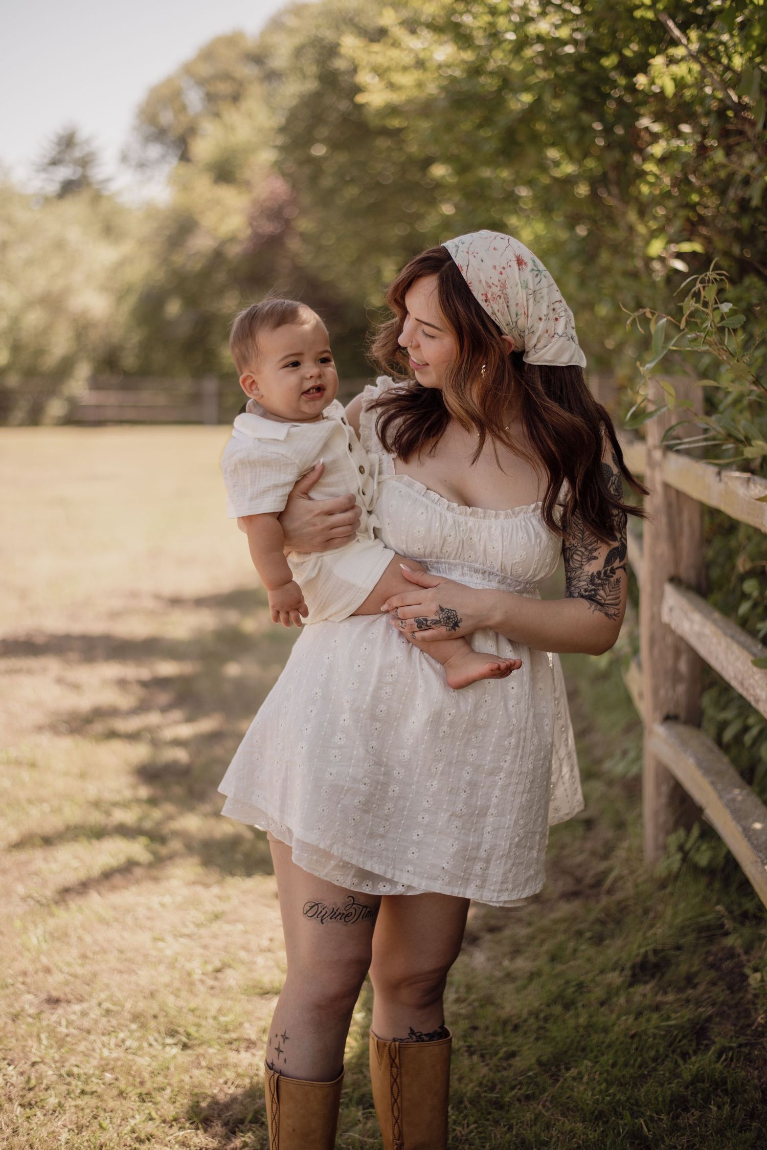 A mother and child wrapped up in each other, capturing the tenderness, laughter, and little moments that make motherhood so fleeting.
