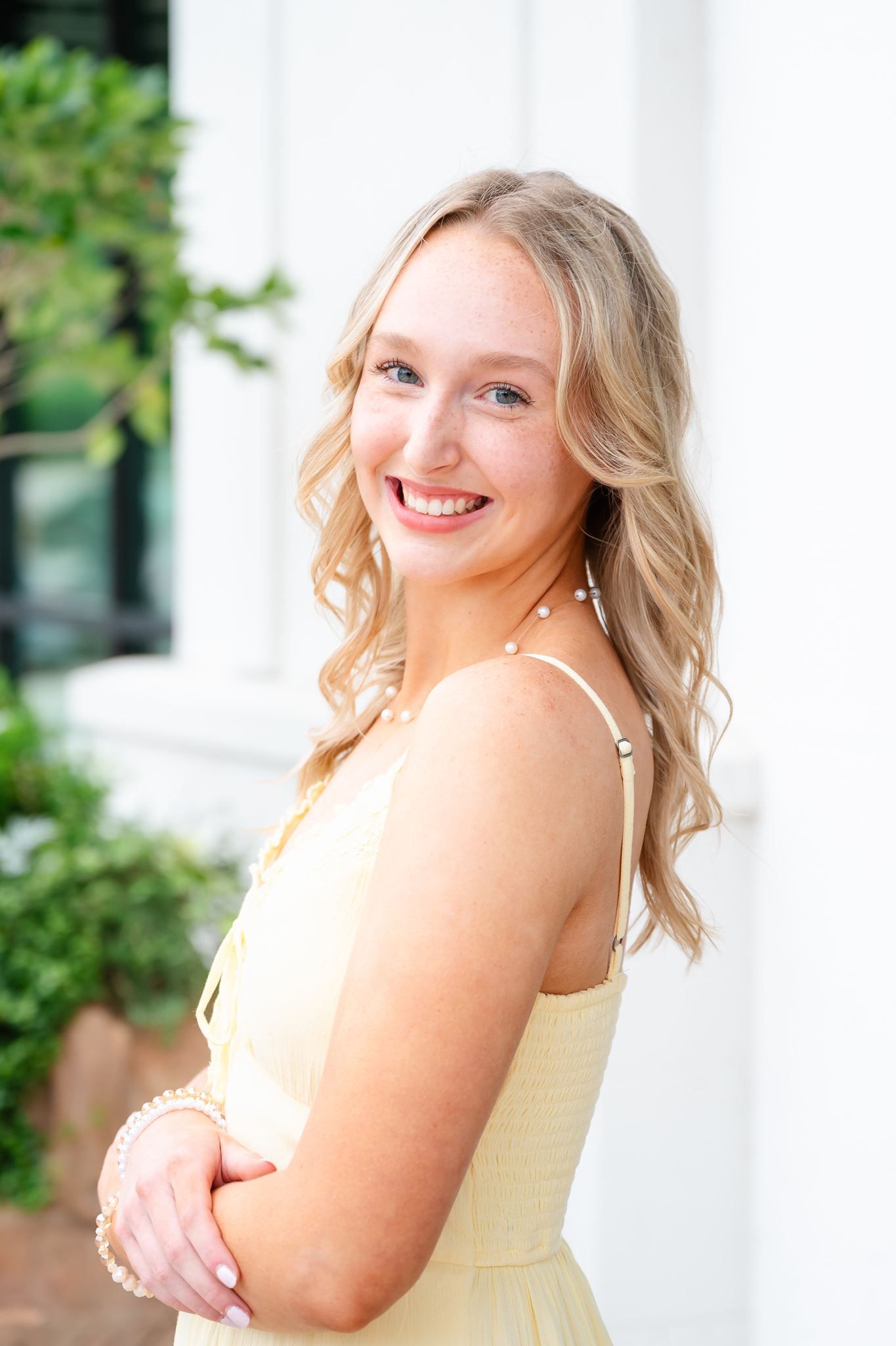 Klein Oak High School senior girl posing at Hughes Landing in The Woodlands Texas