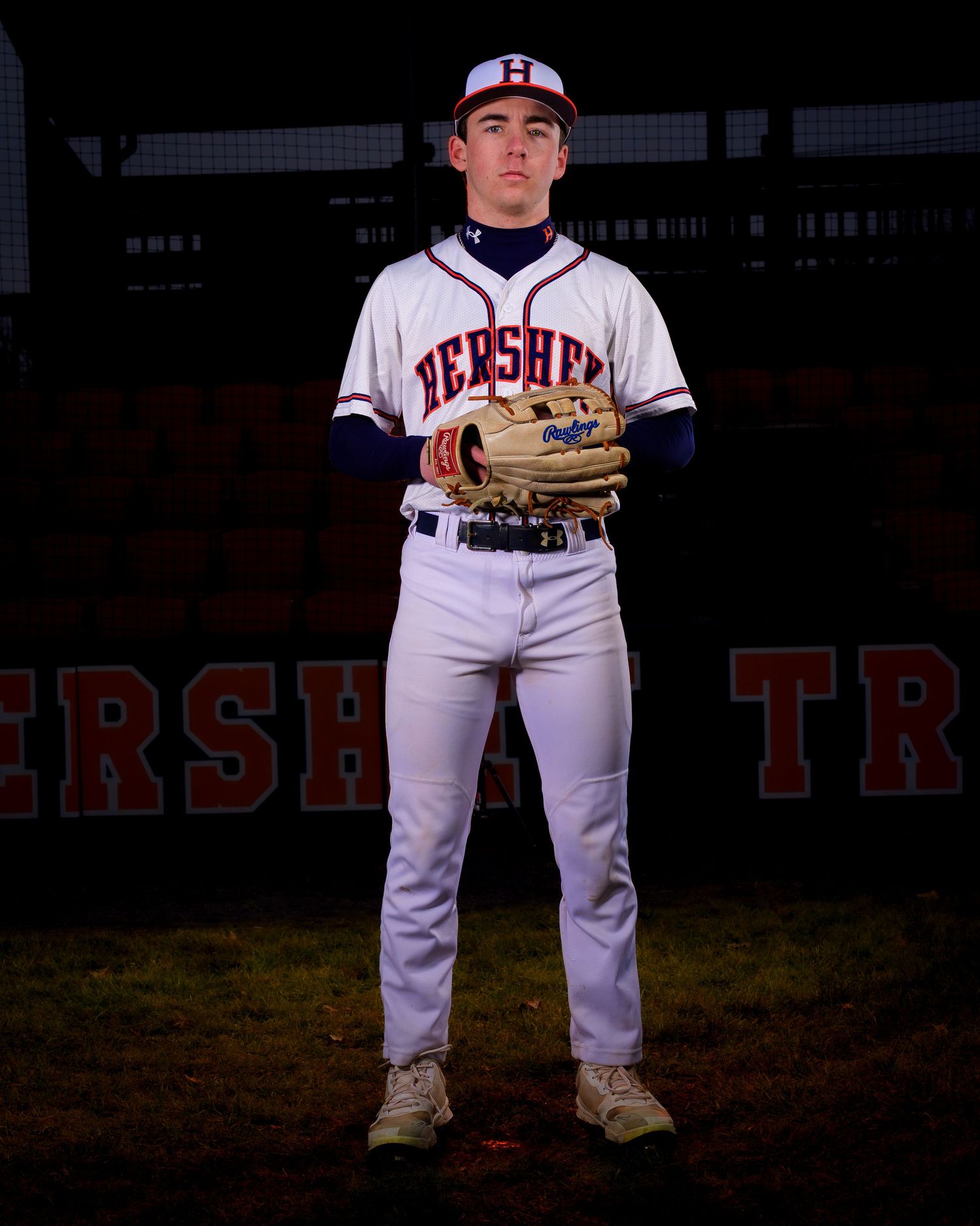 Hershey High School baseball player holding bat for Media Day portrait, by Deanna Fox, SportsFox Photography, Hershey PA
