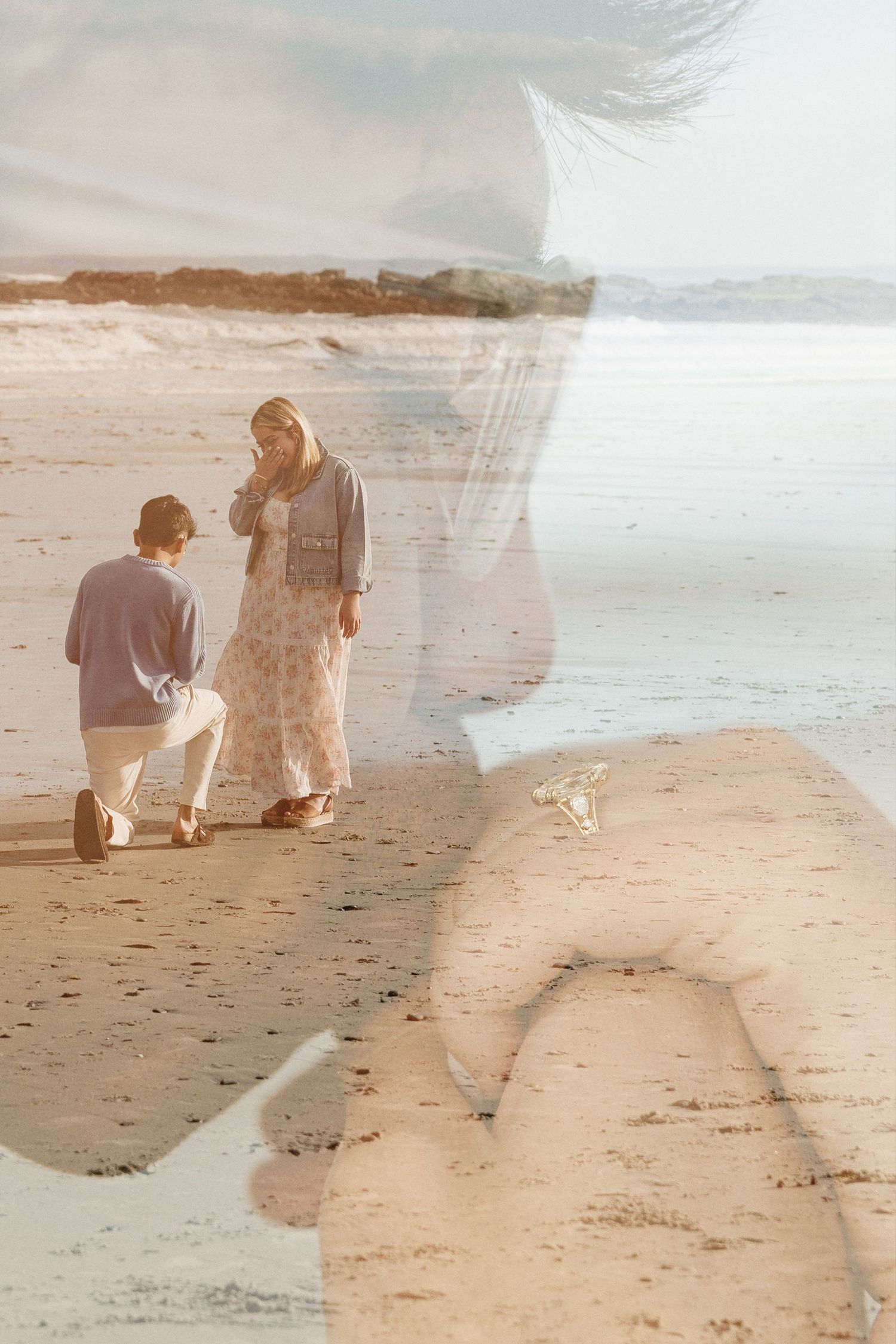 Double exposure of a couple's beach proposal with a man on one knee before a woman in a floral dress by the ocean.