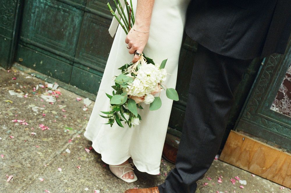 City elopement photography captured on 35mm film with an intimate documentary wedding style