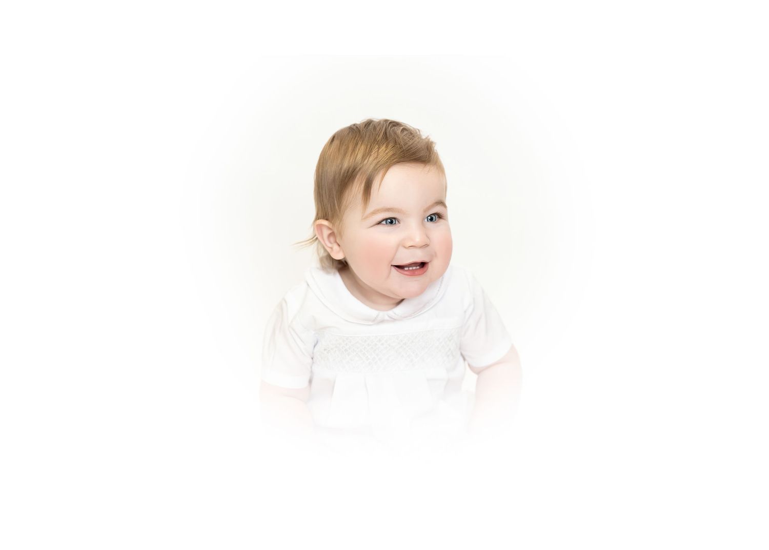 Adorable smiling baby in a white outfit against a bright white background, perfect for infant portrait photography.