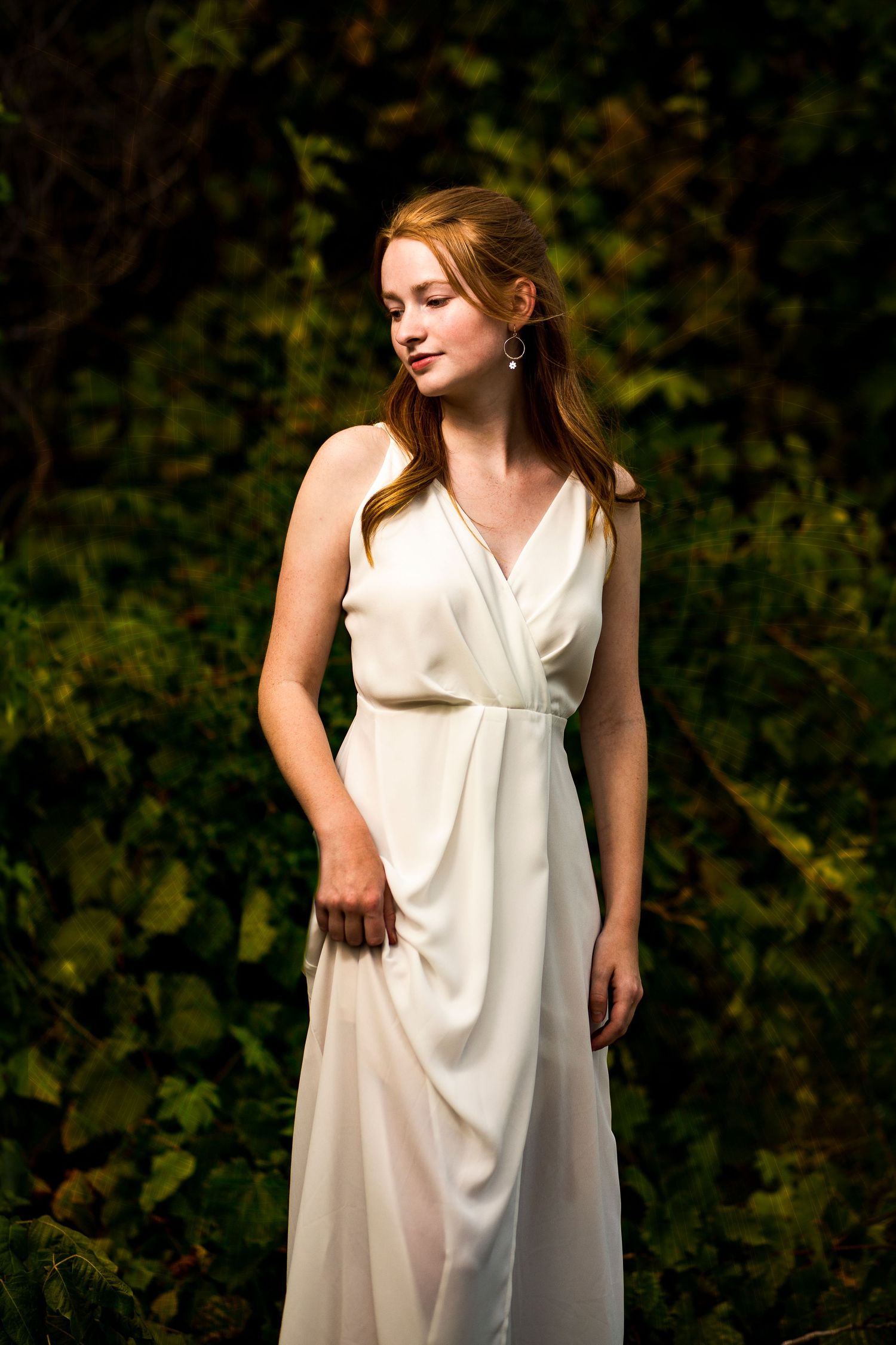 girl by vines