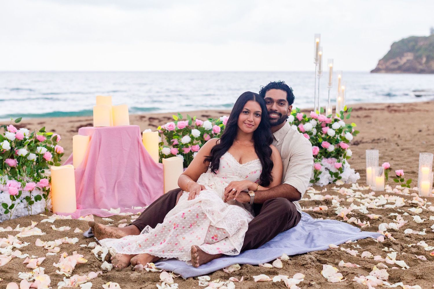 Marriage proposal on the beach with flowers and candles. Playa Guajataca, Isabela, Puerto Rico.