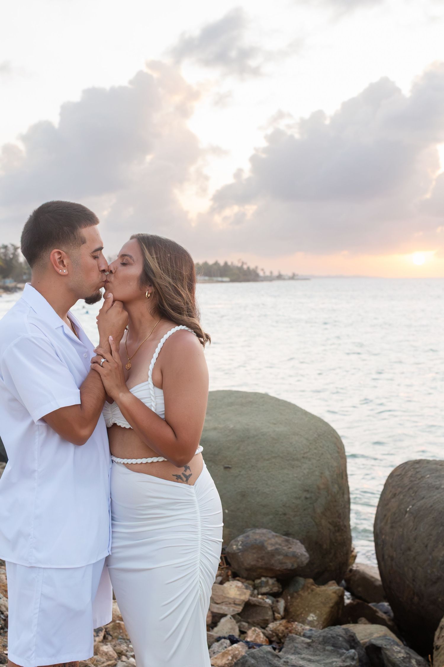 Couples portrait with the ocean and sunset in the background. Río Grande, Puerto Rico.