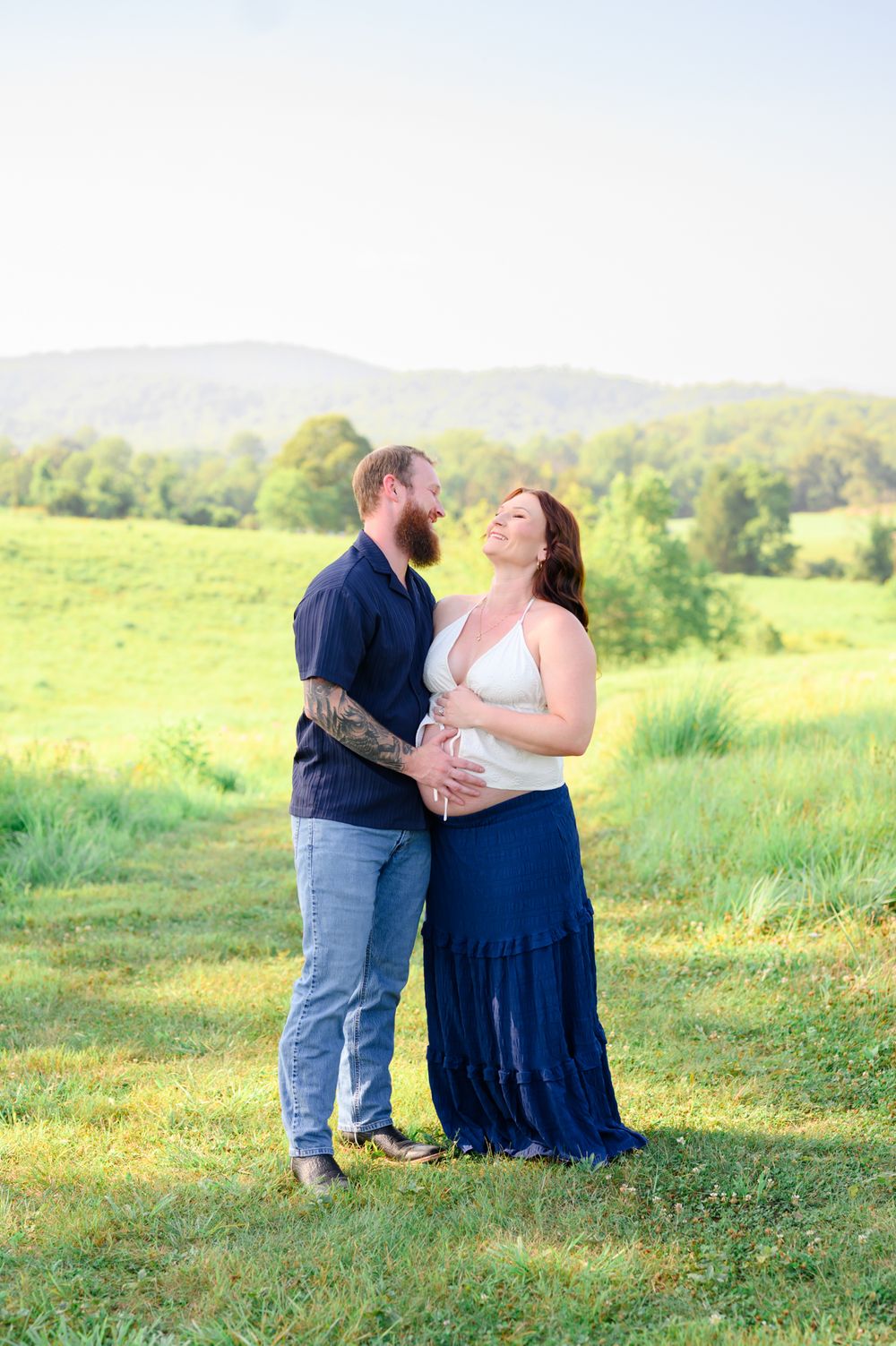 Outdoor maternity photography session in Amherst, VA surrounded by natural beauty, capturing a mother-to-be’s connection, joy, and timeless