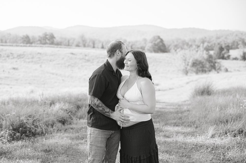 Outdoor maternity photography session in Amherst, VA surrounded by natural beauty, capturing a mother-to-be’s connection, joy, and timeless
