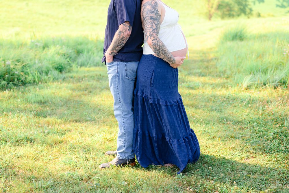 Outdoor maternity photography session in Amherst, VA surrounded by natural beauty, capturing a mother-to-be’s connection, joy, and timeless