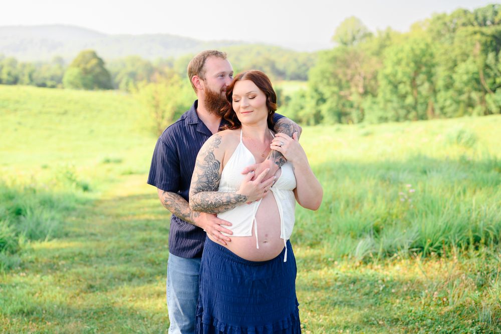 Outdoor maternity photography session in Amherst, VA surrounded by natural beauty, capturing a mother-to-be’s connection, joy, and timeless